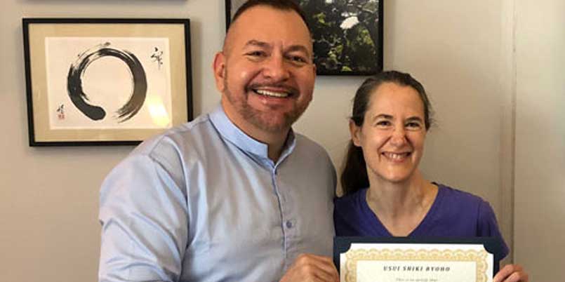Clara-Diebold-Brian-Brunius-Master-Certificate-cropped Photo of Clara Diebold receiving her Reiki Master Certificate from Brian Brunius of the NYC Reiki Center