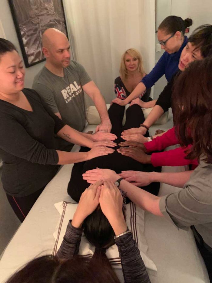 Students of the NYC Reiki Center participating in a Monday night Reiki Circle