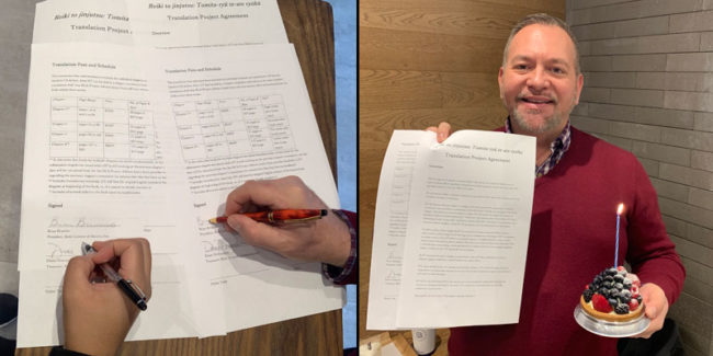 Photo of Brian Brunius signing the contract for an English language translation of Kaiji Tomita's 1933 Reiki book