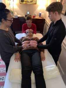 Photo of students participating in a Reiki Circle at the NYC Reiki Center with Brian Brunius
