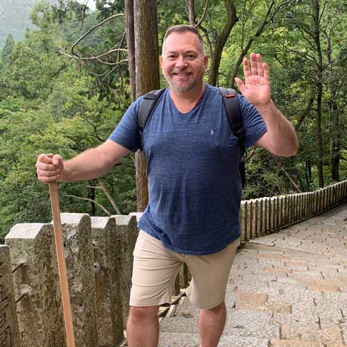 Photo of Reiki Master Brian Brunius of the NYC Reiki Center on Mount Kurama in Kyoto, Japan, the birthplace of Reiki