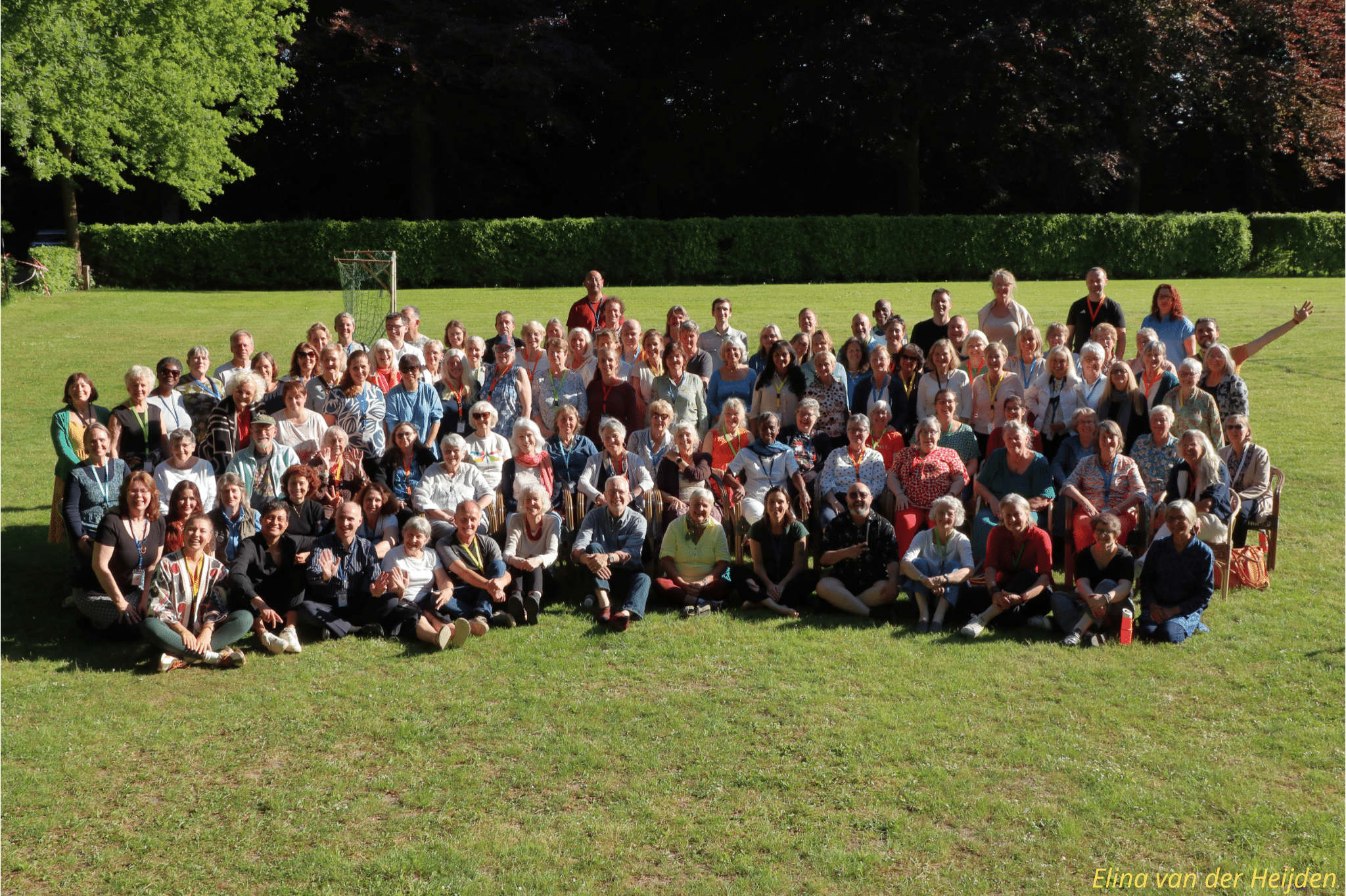A group photo showing the many attendees of the Reiki Alliance 43rd annual conference at Biezenmortel, The Netherlands, in May 2025.