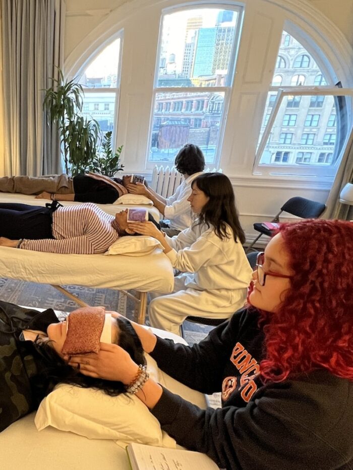 Students of the NYC Reiki Center participating in a Monday night Reiki Circle.